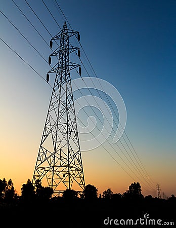 High voltage tower silhouette at sunset