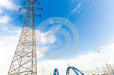 High voltage transmission tower in the wild