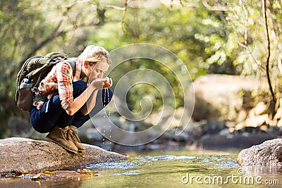 Hiker drinking water