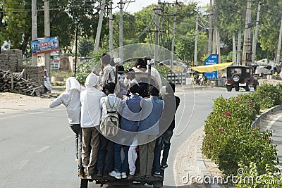 Hindu Indian Family Ride Three Wheel Taxi, Travel to India