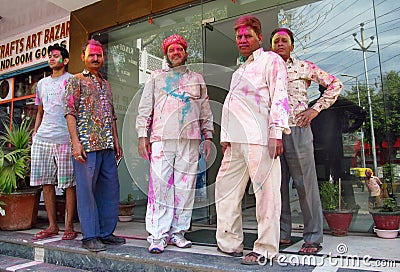 Hindu people celebrating the festival of colours Holi in India