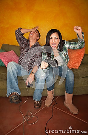Hispanic Couple Playing Video Game