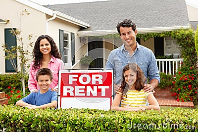 Hispanic family outside home for rent