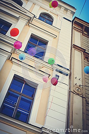 Holiday colorful balloons are flying to the sky