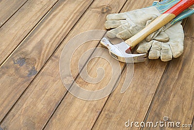 Home improvement gloves and hammer background