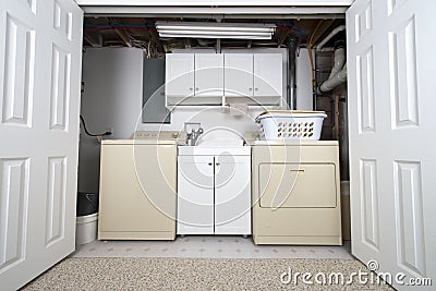 Home Laundry Room in Basement Closet and Utility Room