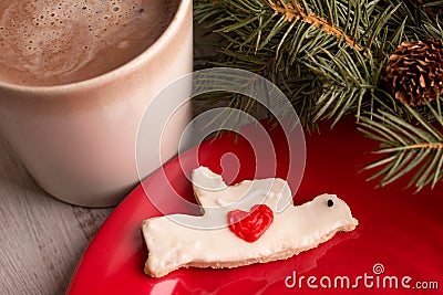Home made Christmas dove heart cookie with hot chocolate