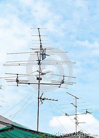 Home TV antennas mounted on a roof