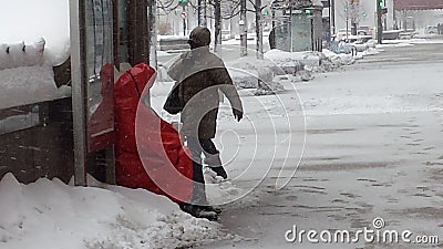 Homeless man found shelter at Bus Stop during Snow Storm