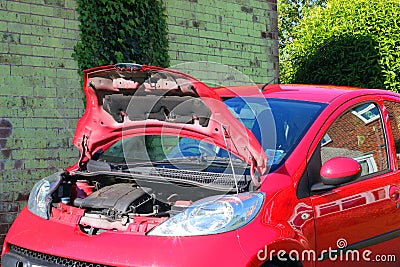 Hood or bonnet open on a vehicle.