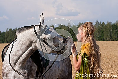 Horse and woman face to face