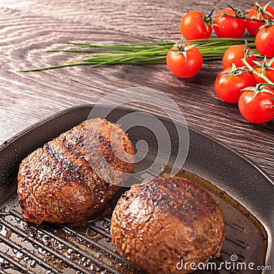 Hot fresh steaks on pan