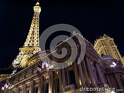 Hotel lit up at night, Paris Las Vegas, Nevada,