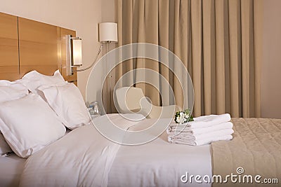 Hotel room and white flowers