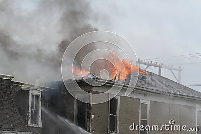 House burning, roof, Montezuma, Iowa