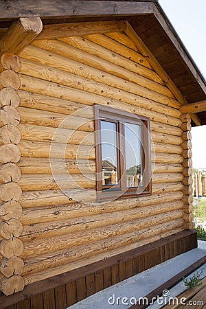 House. Wooden frame. Window in the wall wooden frame