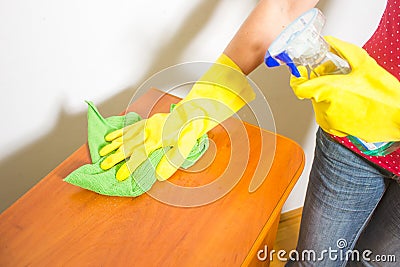 Household, cleaning with rag and gloves.