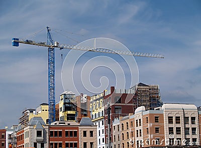 Huge Crane on Top of a Building