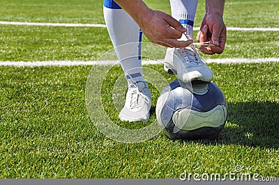Human leg and soccer ball