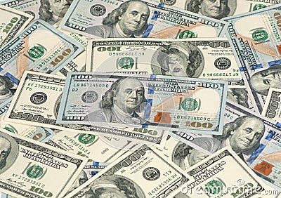 Hundred dollar bills in a pile
