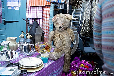 Hundred years old and sad teddy bear
