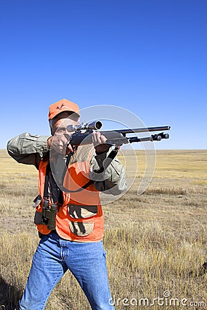Hunter With Rifle Shouldered