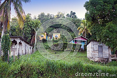 Huts along the road in a sunny day. Jamaica