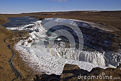 Ice covered Golden Falls, Gullfoss waterfall, Iceland.