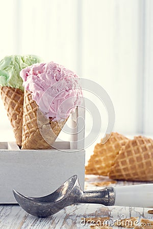 Ice cream cones with an old metal scoop