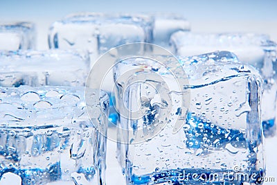 Ice cubes on blue background