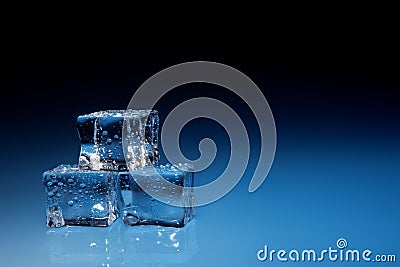 Ice cubes with water drops background
