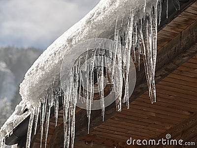 Icicles and snow on the roof