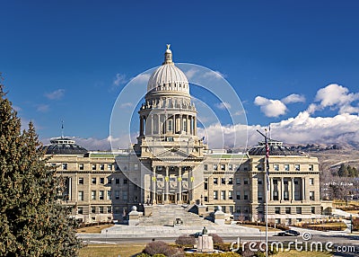 Idaho state capital building with clearing clouds