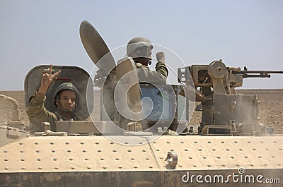 IDF Soldiers in tank making peace sign