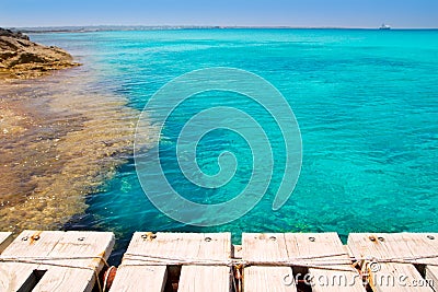 Illeta wooden pier turquoise sea Formentera