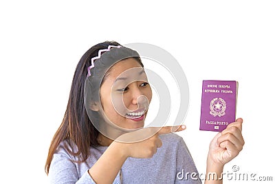 Immigrant woman holding Italian passport