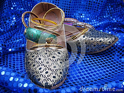 India Shoes and Bangles on Blue Sequins