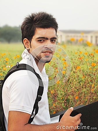 Indian College student with books.