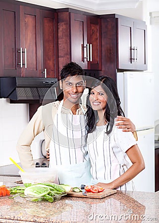 Indian couple in kitchen