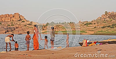 Indian family near the river