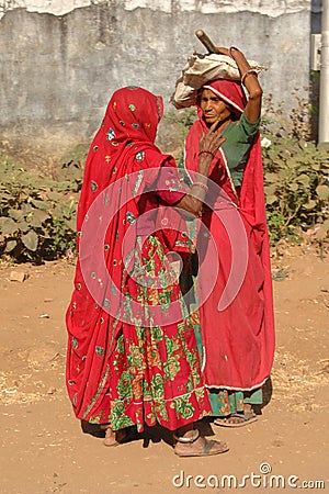Indian ladies in red sari