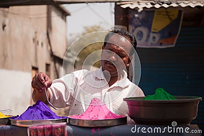Indian man with Color full colors of holi