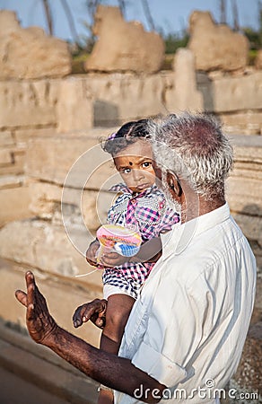 Indian man with little girl in India