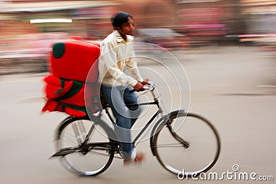 Indian man riding bike, blurred motion, Sadar Market, Jodhpur,
