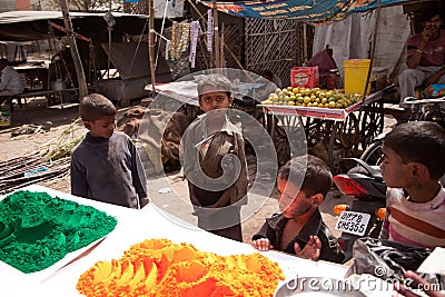 Indian poor children and Color full colors of holi