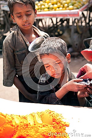 Indian poor children and Color full colors of holi