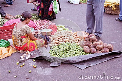 Indian woman selling vegetables