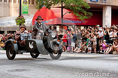 Indiana Jones Characters Ride Motorcycle In Atlanta Dragon Con Parade