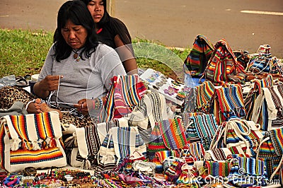 Indigenous women selling traditional south america handmade bags