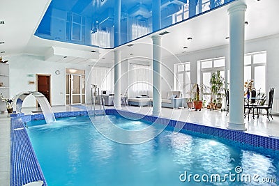 indoor-big-blue-swimming-pool-interior-17635215.jpg